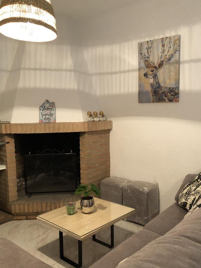 Casa Bheinn Aracena Bagian luar foto